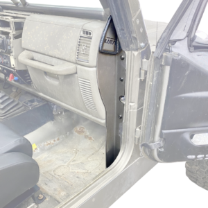 TJ cage stanchion detail — CNC-formed 3/16" steel plate with floor and body mounting profile
